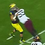 UofM Coaching allowing Quarterback to continue play after this hit and subsequent stumbling on the field after.